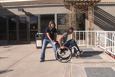 Thumbnail image for "Craig Hospital Wheelchair Skills: How to Assist with Going Up and Down a Curb"